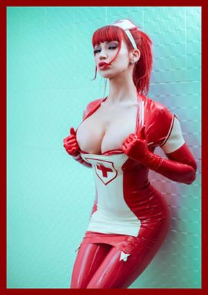 bare breasts in latex costume of a nurse