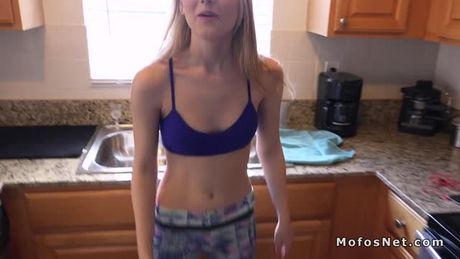 Teen girlfriend in leggings bangs on the sofa