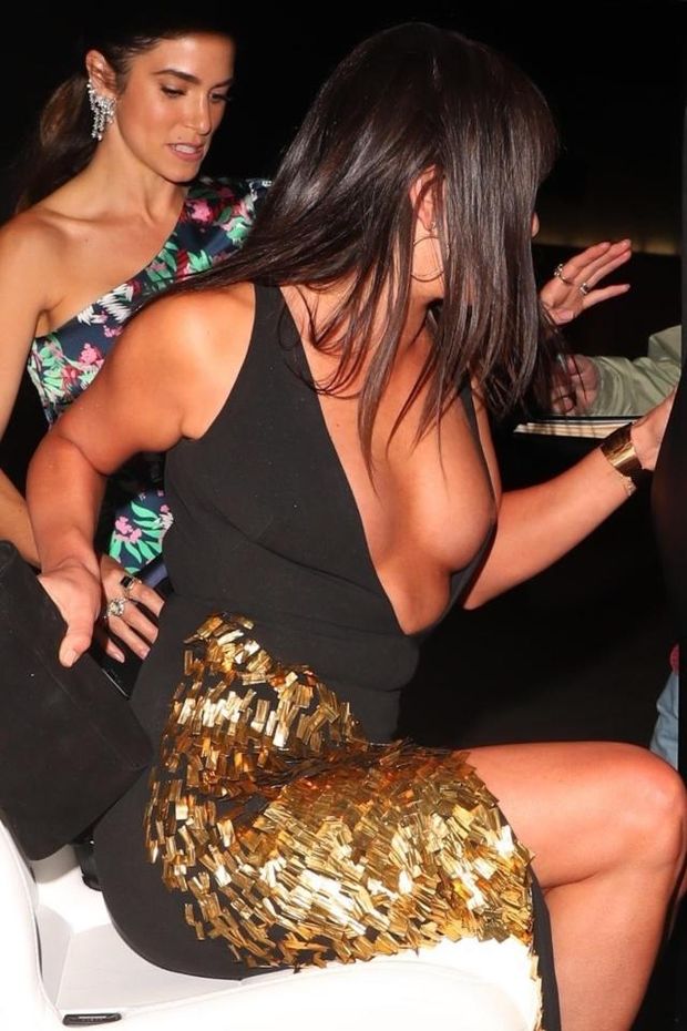 Lea Michele accidentally flashes her nipple as her plunging dress slips open after Elton John Oscars party 2018.