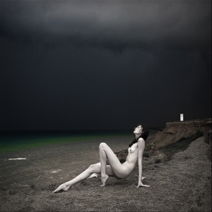 Beautiful Woman under darkened skies