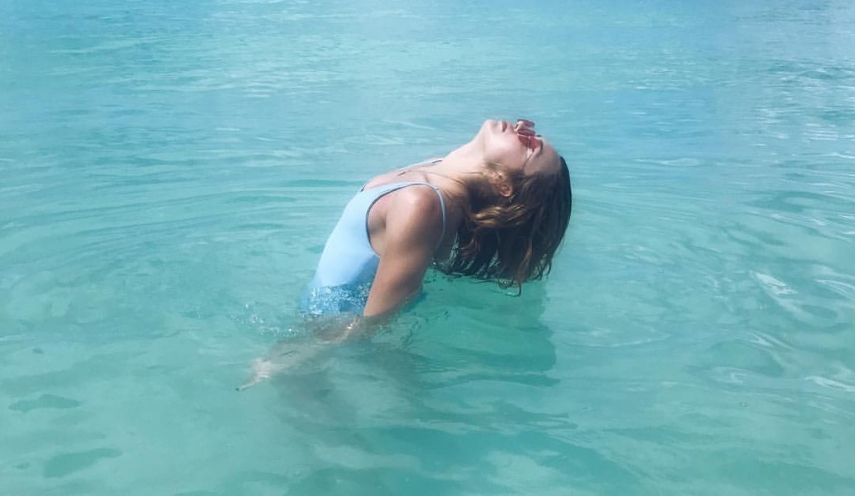 Peyton list is looking sexy as in blue bikini