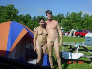 Showing off his nude wife while camping.