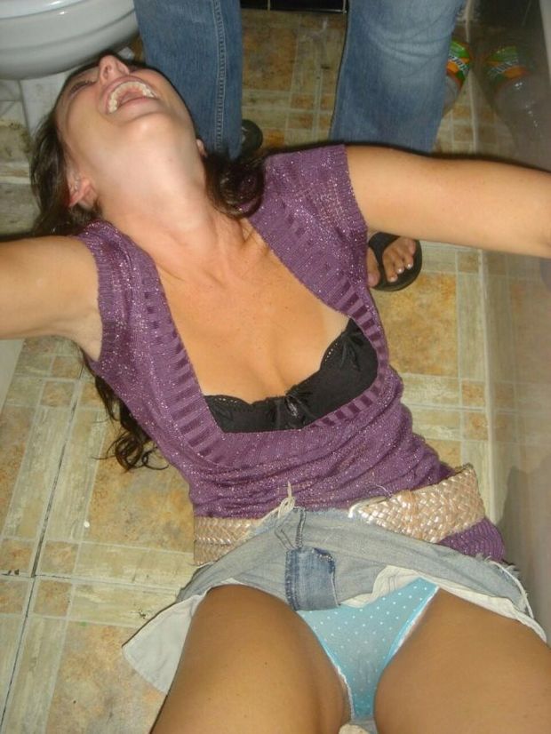 Wasted slut with all her goodies hanging out!