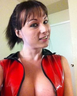 Ventura Slutson shows her cleavage to your ass in her red pvc latex thinga - lett fota smilez