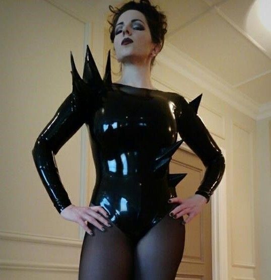 Mandy Star is weird chick in bizarre odd black latex suit with points on her strange outfit - pvc weirdd lett fota ppale skin ggg