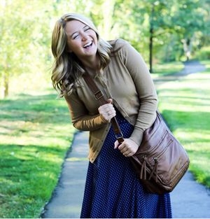 Elizabeth Roberts is looking sexy as hell in blue dress with big boobs
