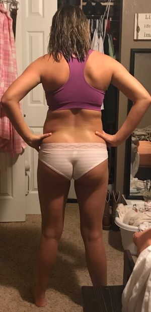 This chick took some shots of herself to track her progress working out. Rear view.