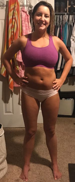 This chick took some shots of herself to track her progress working out. Front view.