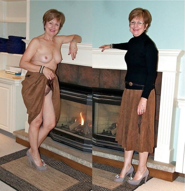 GILF in front of fireplace