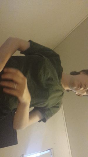 Hot wife taking off her shirt