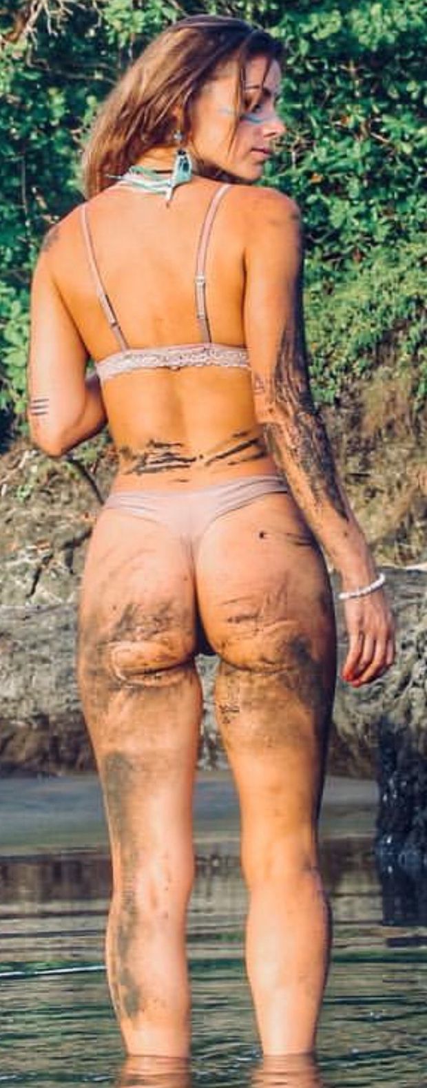 Thong on this hot chick playing in he mud.