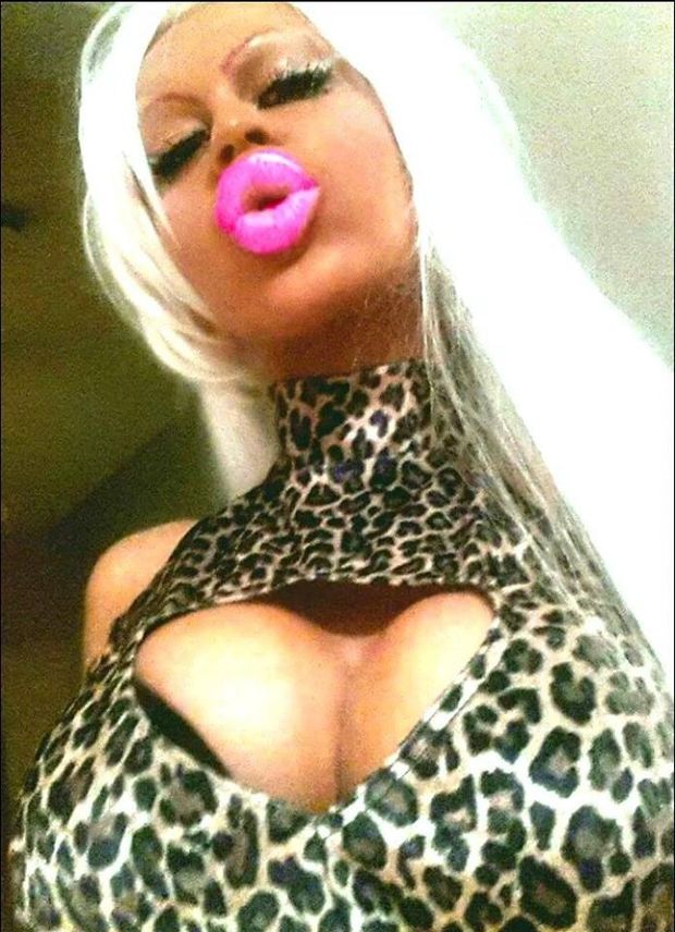 Barbie Jade is a skank with big silly plump pink lips - leopard skin shirt - fota lipz