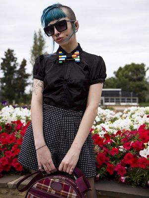 Monique Deville has a cool hair cut style in a silk button-up shirt - fota zxzx