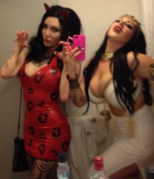 Scarlett Moon in red rubber with besty Micky Syndrome in a face book post - fota lett pvc hff