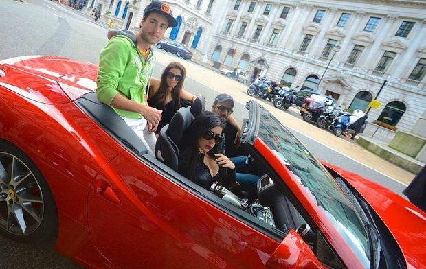 Micky Syndrome is a bad ass bimbo babe in her Ferrari sports car with her friends in latex