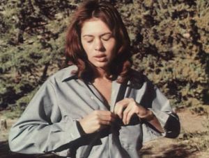 Vintage exhibitionist going topless outdoors