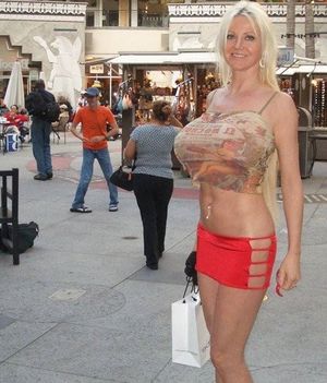 Lori Pleasure aka Laurie Pleasures in half shirt