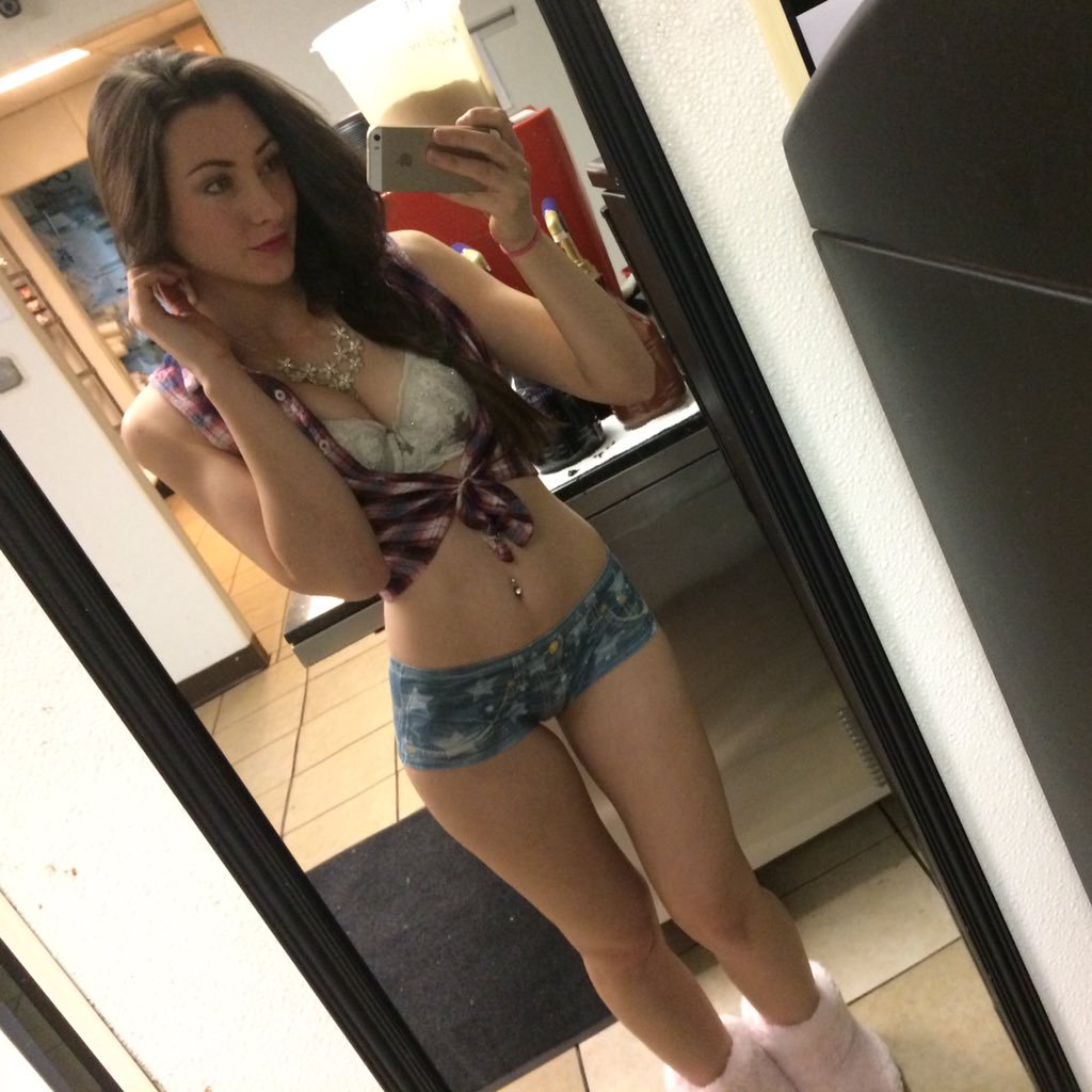 Sexy at home in front of a mirror