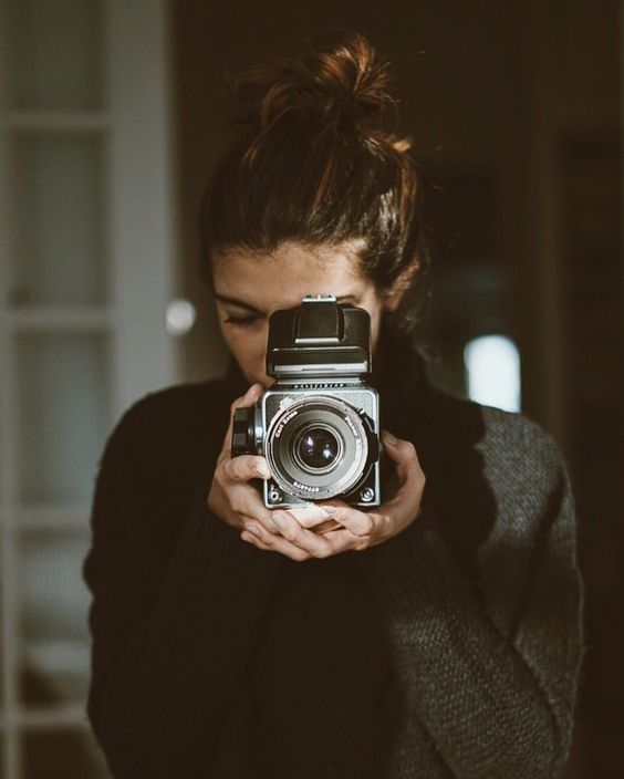Brunette Non-Nude with old camera