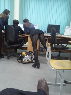 Sexy brunette in stockings asking or it in the class