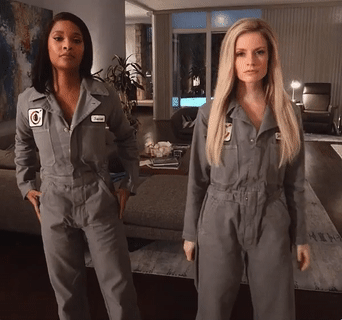 Two babes in uniform show what they have