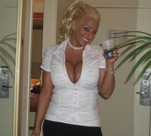 Cleavage Mustaine is sexy as hell in her silk buttons