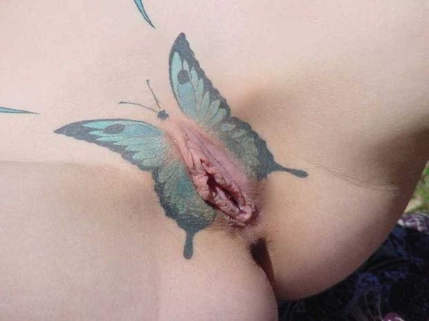 Beautiful butterfly tatoo...I have to get into this business!