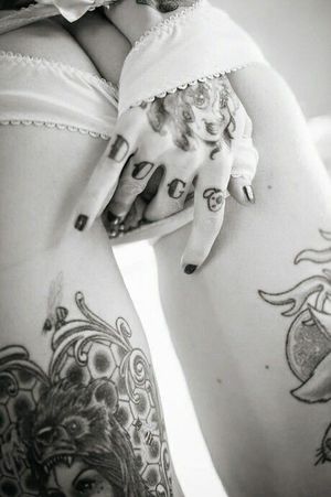 Those tattoo'd finger snaking their way under her panties