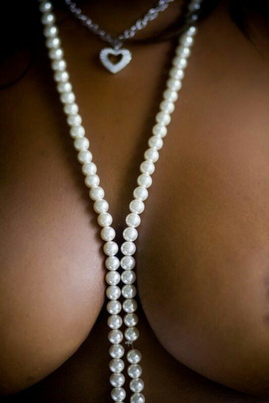 yummy cleavage and pearls