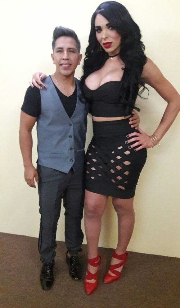 Alexis La Vega holds an exceptionally tine 4 foot 2 4"2' who is her paying Jon for the night - SGB holdd