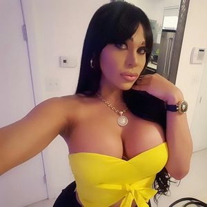 Tamarah Isabella in yellow w/ nice cleavage showing from her milf shirt - SGB