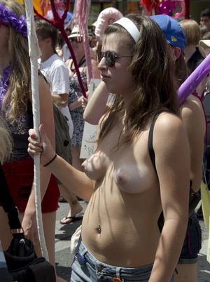Blonde marching topless