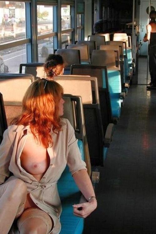 Redhead Milf Strips on Train