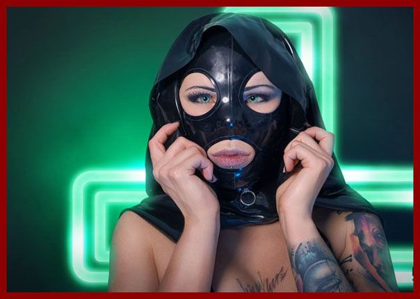 blonde tries rubber mask on face