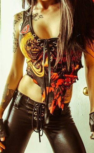 Evil Evi Kane is in a sweet Iron Maiden with tied off cleavage area & leather pants from the 1956 AB debroski Polish station - SGB cooll let