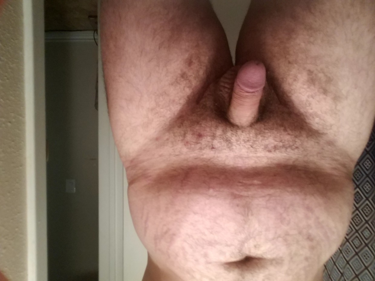 Slightly overweight white guy with tiny limp dick