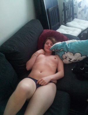 On The Couch Semi Naked And Sexy Amateur