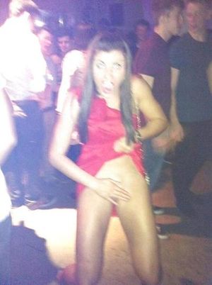 Flashing her minge in the club