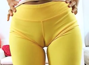 Winona in yellow yoga pants