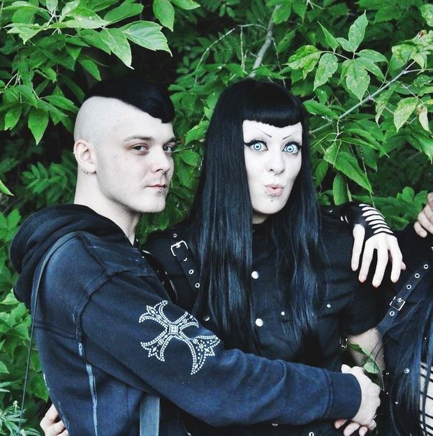Little Billy The Drug Addict is being held by her punker boytoy with a mohawk - SGB gothh holdd