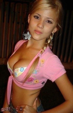 Cute honey with her bra showing.