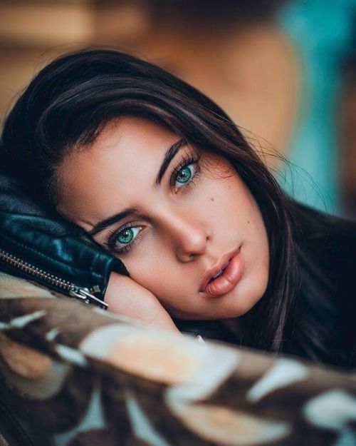 Brunette with Blue-Green Eyes