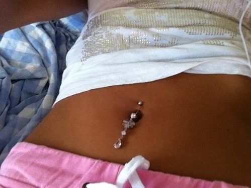 Tanned Cutie With Belly Ring