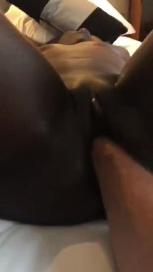 Black babe gets a hard fist fucking from a big white fist.