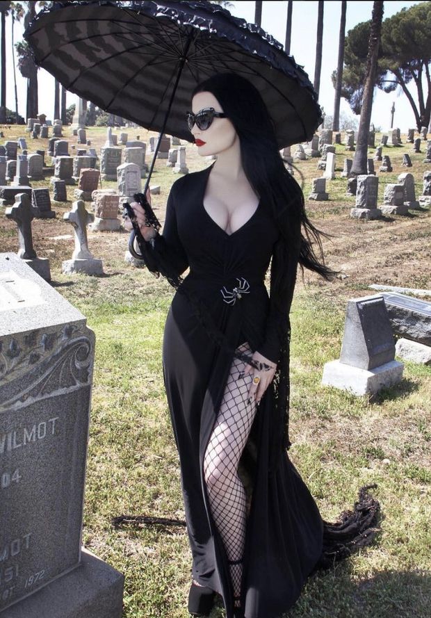 Slutty goth bimbo at a graveyard