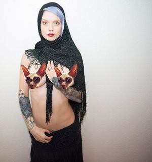 Pareidolia Suicide takes a picture for facebook that is censored with puppie dogs - SGB