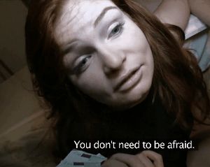 Money talks with redheaded lady