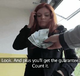 Money talks with redheaded lady