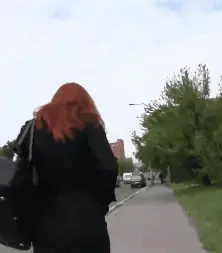 Money talks with redheaded lady