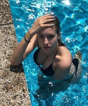 Big tits in the swimming pool.